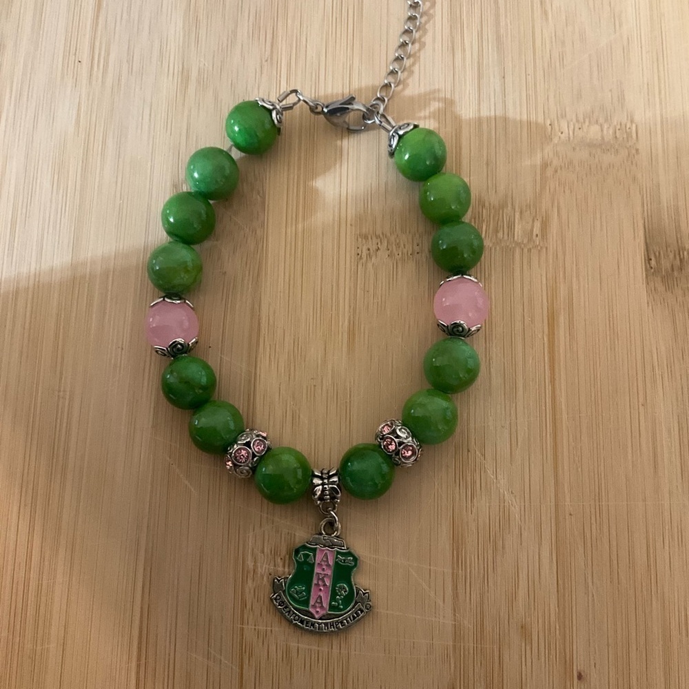 Hand Crafted Green and Pink Beaded Bracelet with AKA Charm